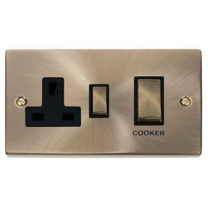 Click VPAB504BK Deco Antique Brass 45A DP Cooker Control Switch With 13A Switchsocket, Ingot Switches & Black Inserts