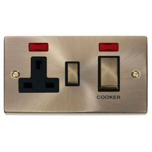 Click VPAB505BK Deco Antique Brass 45A DP Cooker Control Switch With 13A Switchsocket, Neons, Ingot Switches & Black Inserts